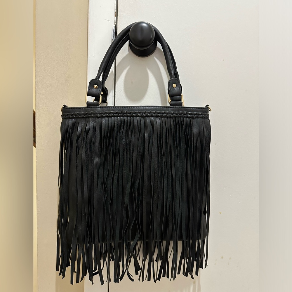Leather fringe bag.
